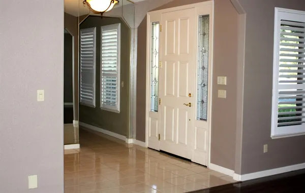 an empty room with windows