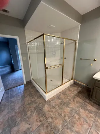 a close view of bathroom sink and window