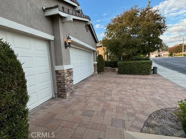 a view of a back yard of the house