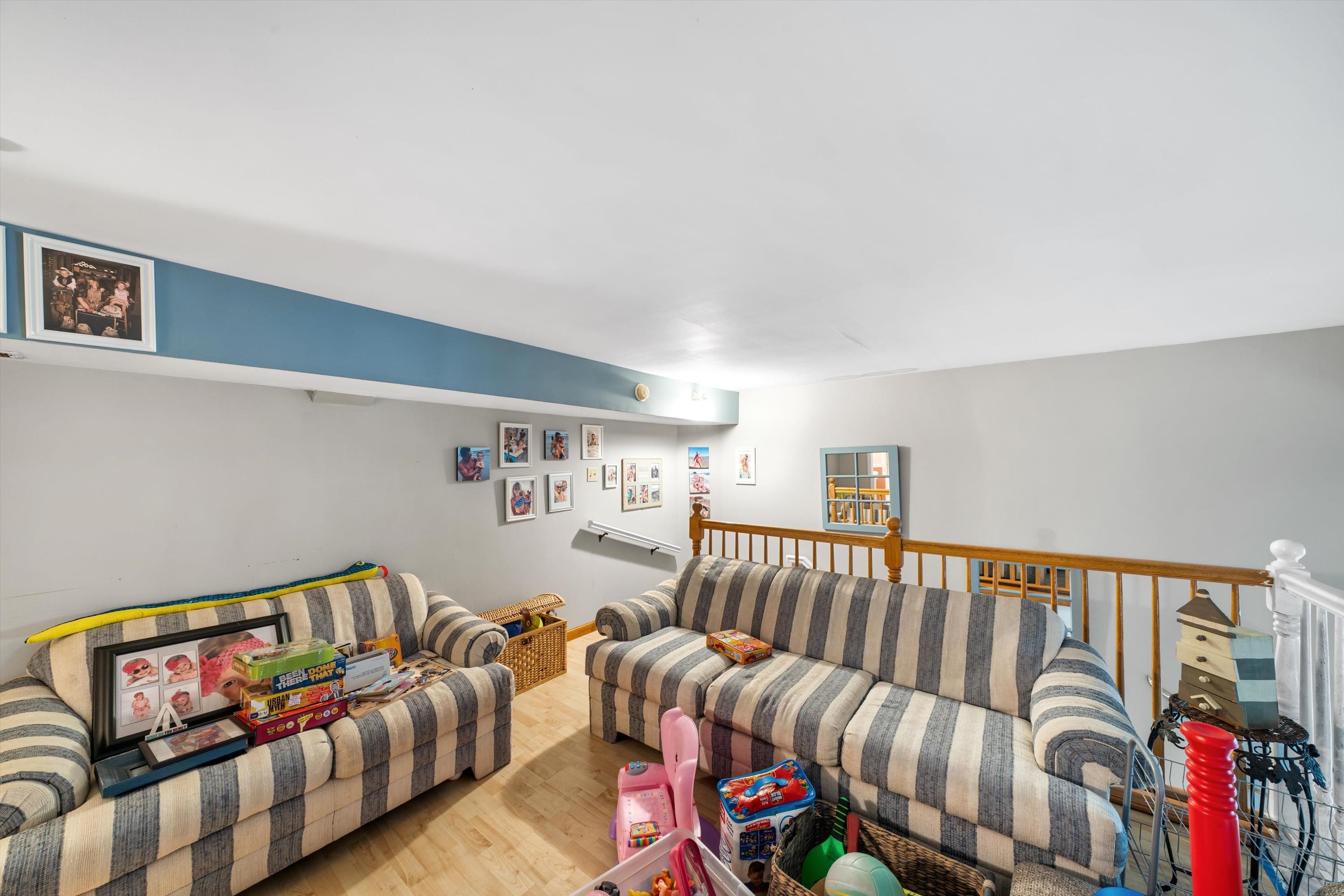 5105 Shawcrest Road, Unit 5105 Wildwood, NJ 08260 - Photo 28 of 31 a bedroom with furniture and a couch