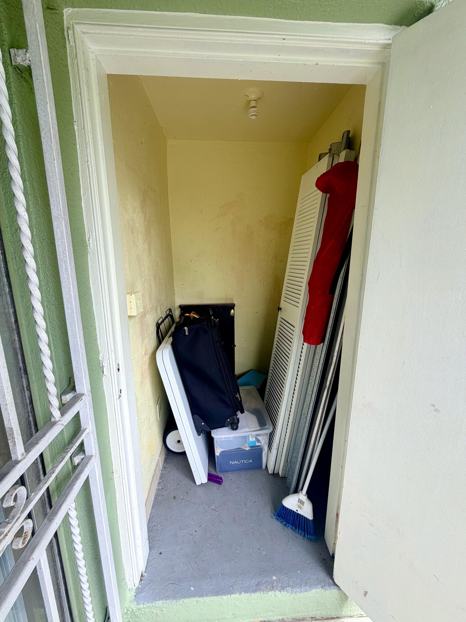11071 Northwest 7th Street, Unit 104 Miami, FL 33172 - Photo 14 of 30 a view of a hallway with furniture and a window