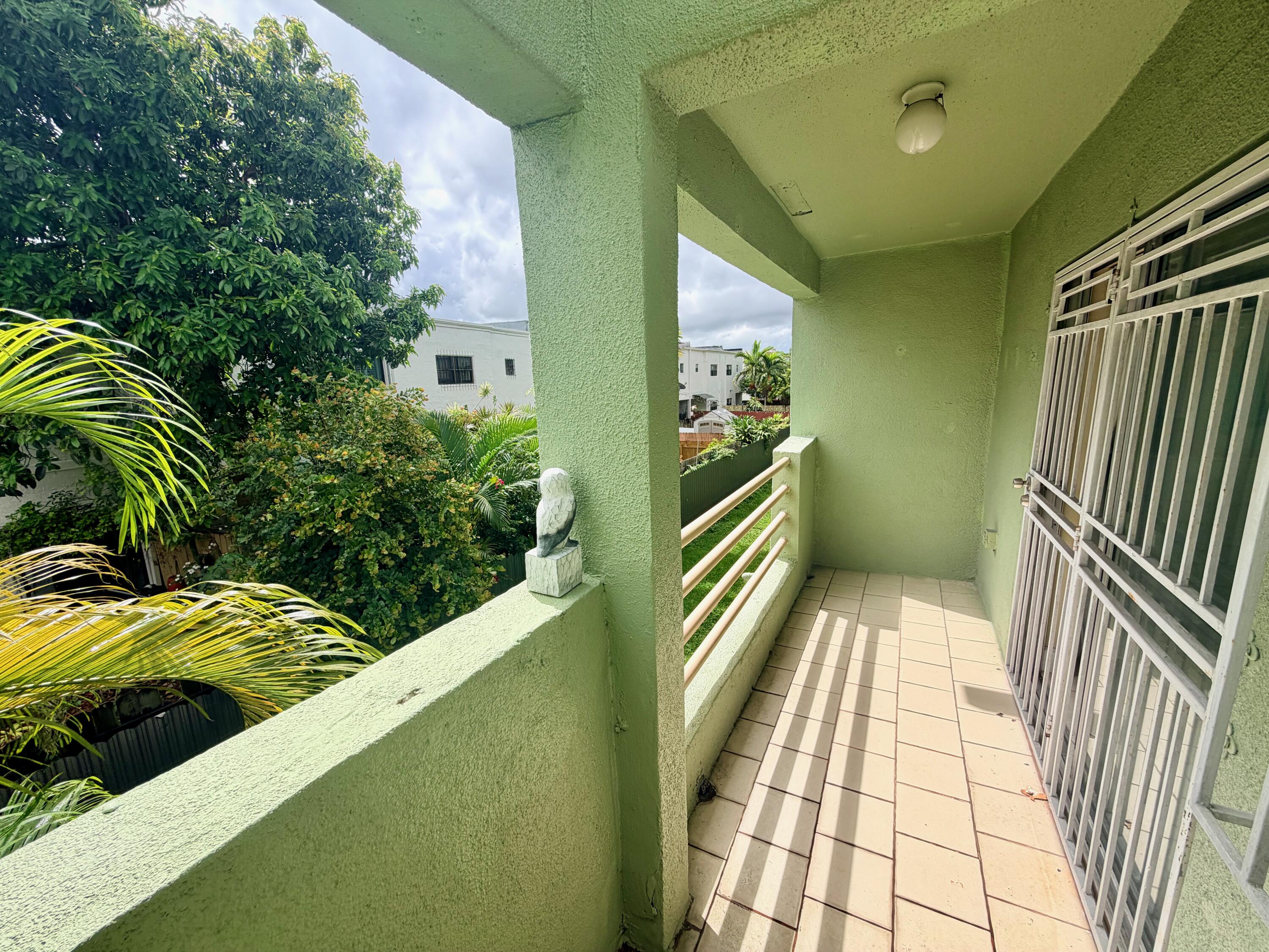 11071 Northwest 7th Street, Unit 104 Miami, FL 33172 - Photo 23 of 30 a view of balcony and deck