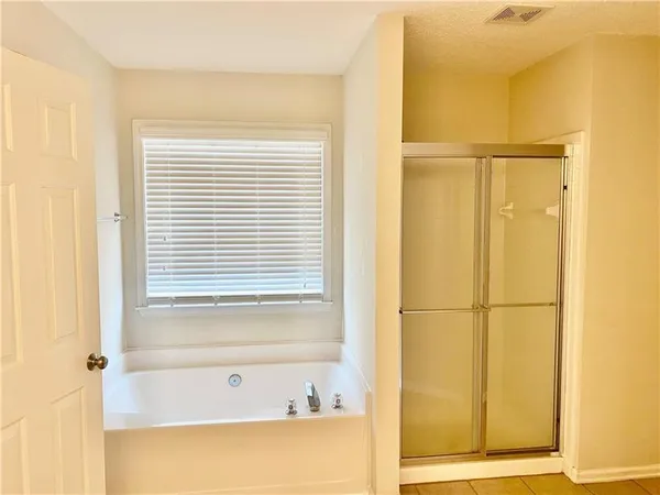 a bathroom with a bathtub