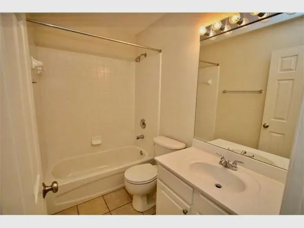 a view of a glass door with a floor to ceiling window