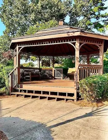 a view of a swimming pool with an outdoor space