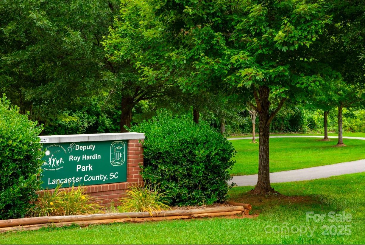 2182 Flicker Road, Unit 1036B Indian Land, SC 29707 - Photo 14 of 17 a view of a house with a yard