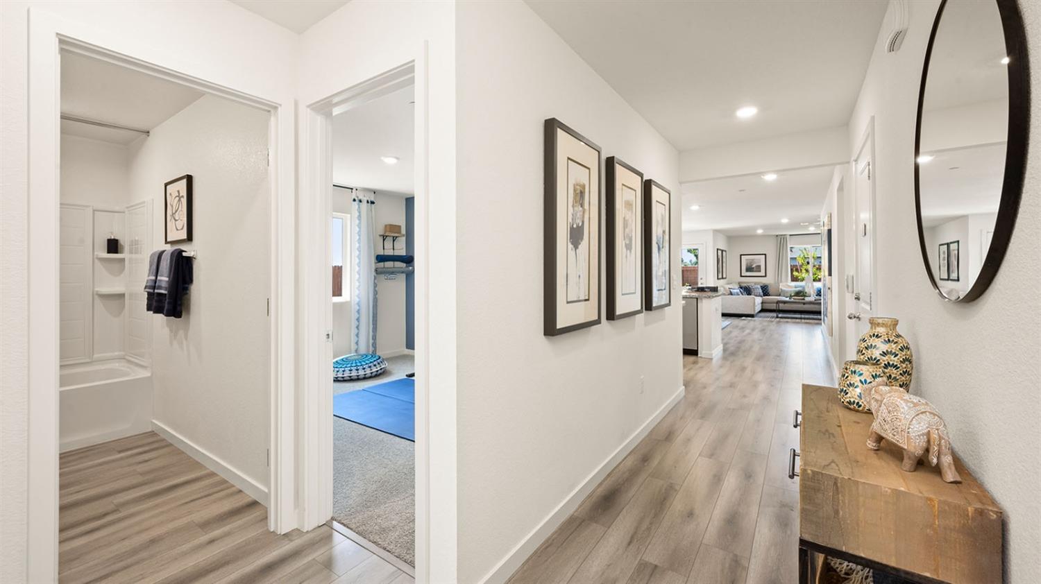 2224 Roesler Drive Yuba City, CA 95993 - Photo 3 of 9 a view of a hallway view with wooden floor and living room