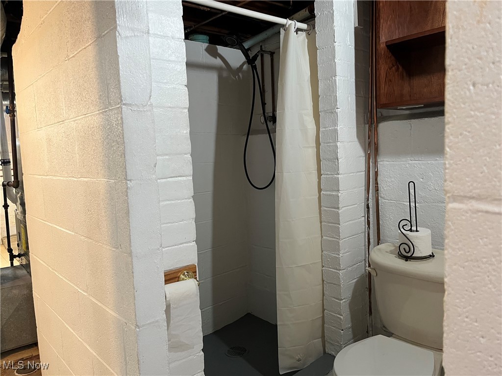 15405 Corkhill Road Maple Heights, OH 44137 - Photo 45 of 50 Basement Bathroom has a walk in shower.