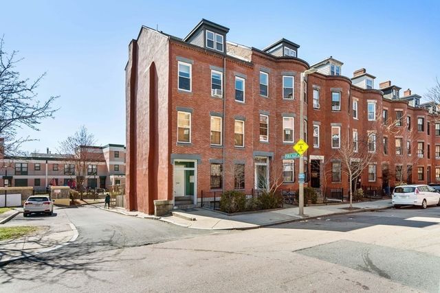 a front view of a building with street view