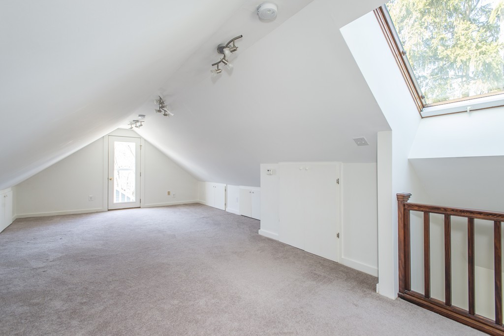 39 Loveland Road Brookline, MA 02445 - Photo 8 of 8 a view of an empty room with a window