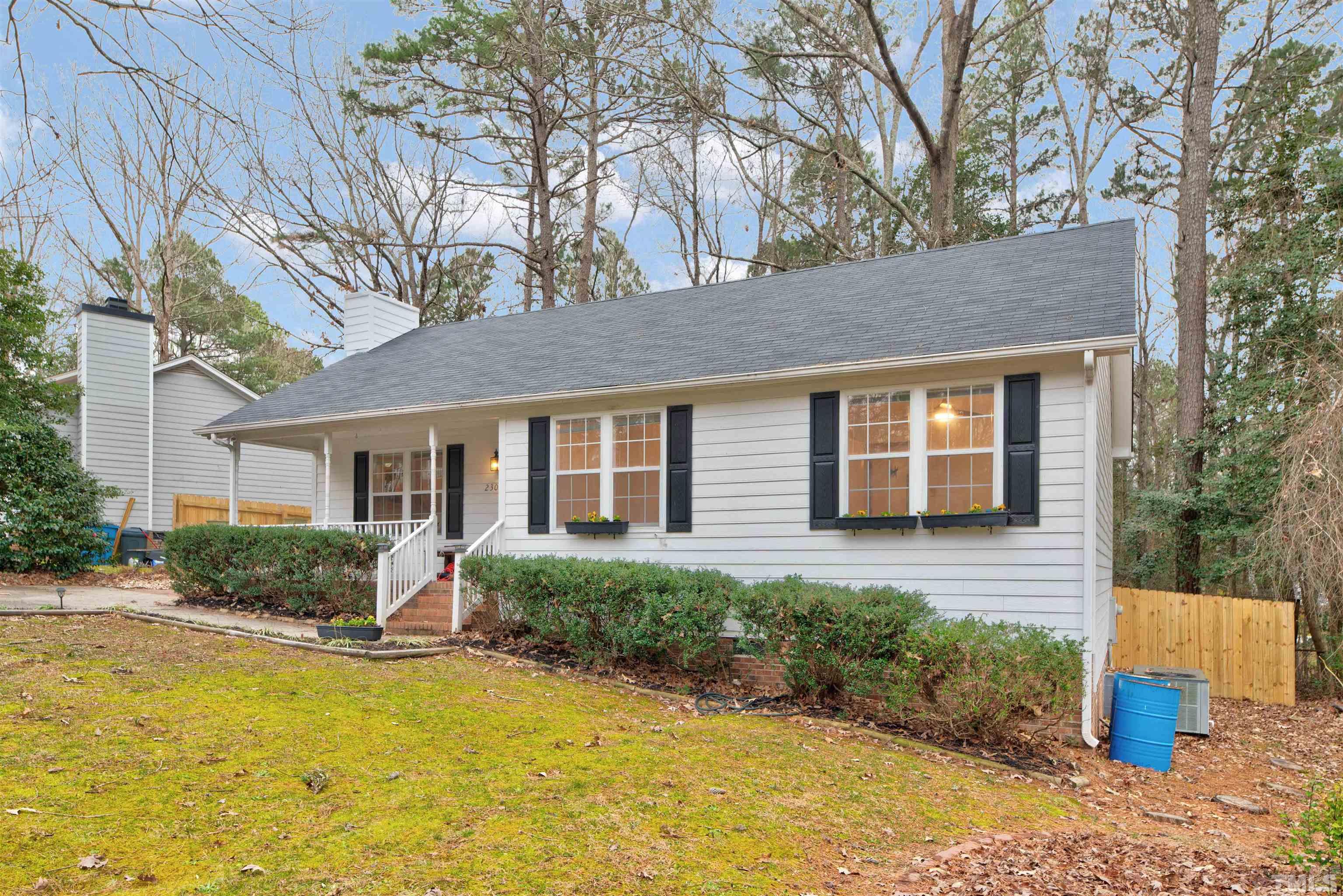 2305 Ruddy Road Raleigh, NC 27616 - Photo 3 of 37 a front view of house with yard and trees around