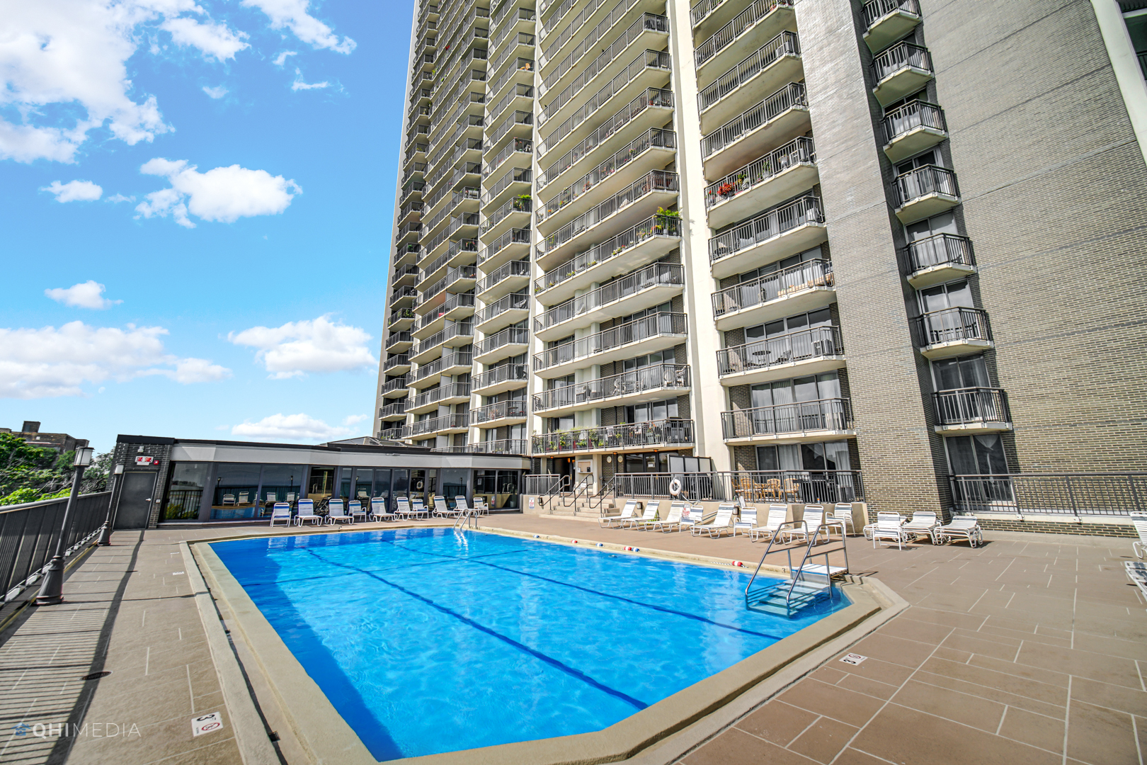 6007 North Sheridan Road, Unit 30D Chicago, IL 60660 - Photo 19 of 25 a view of building with swimming pool
