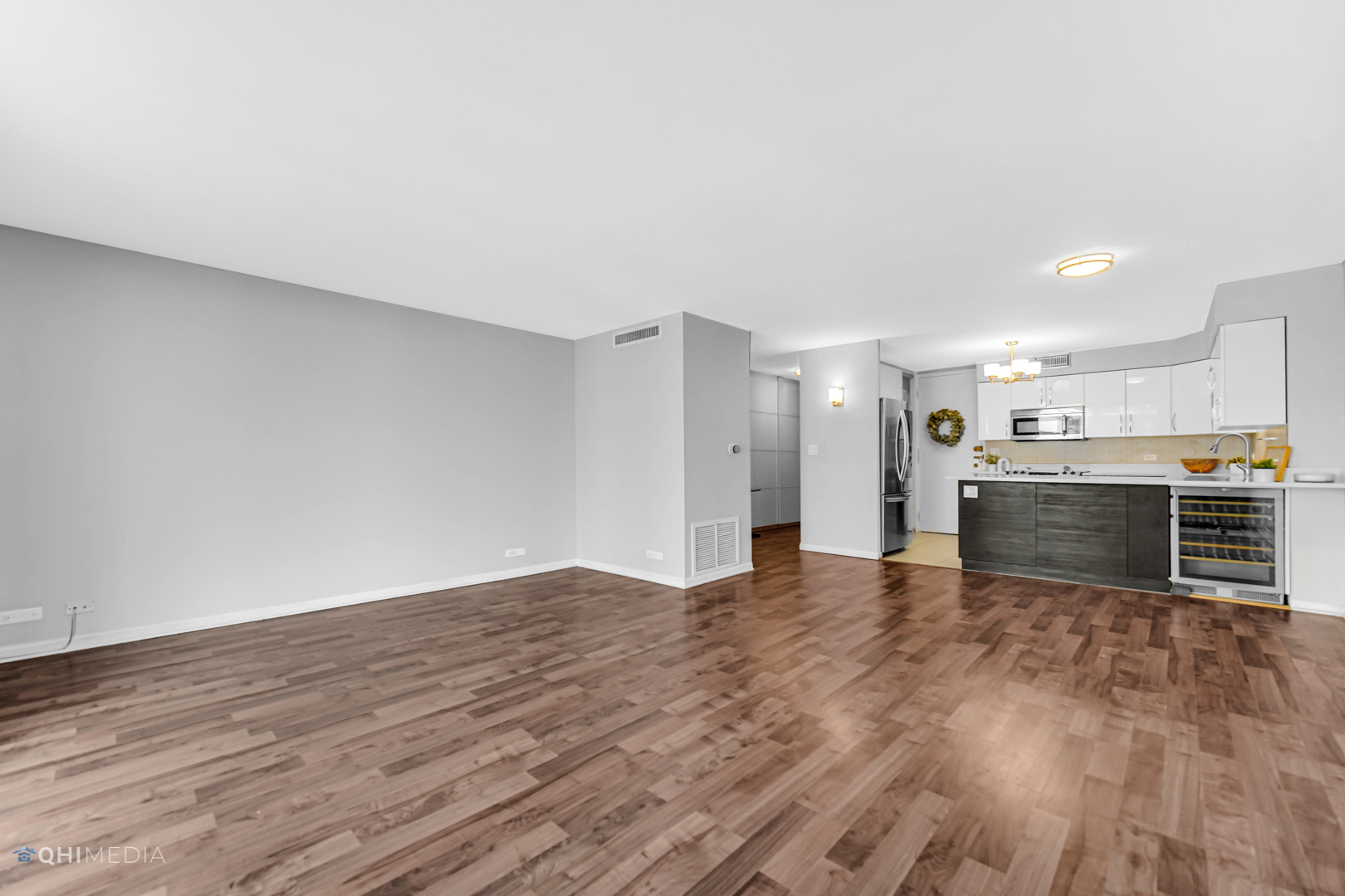 6007 North Sheridan Road, Unit 30D Chicago, IL 60660 - Photo 9 of 25 a view of kitchen with wooden floor