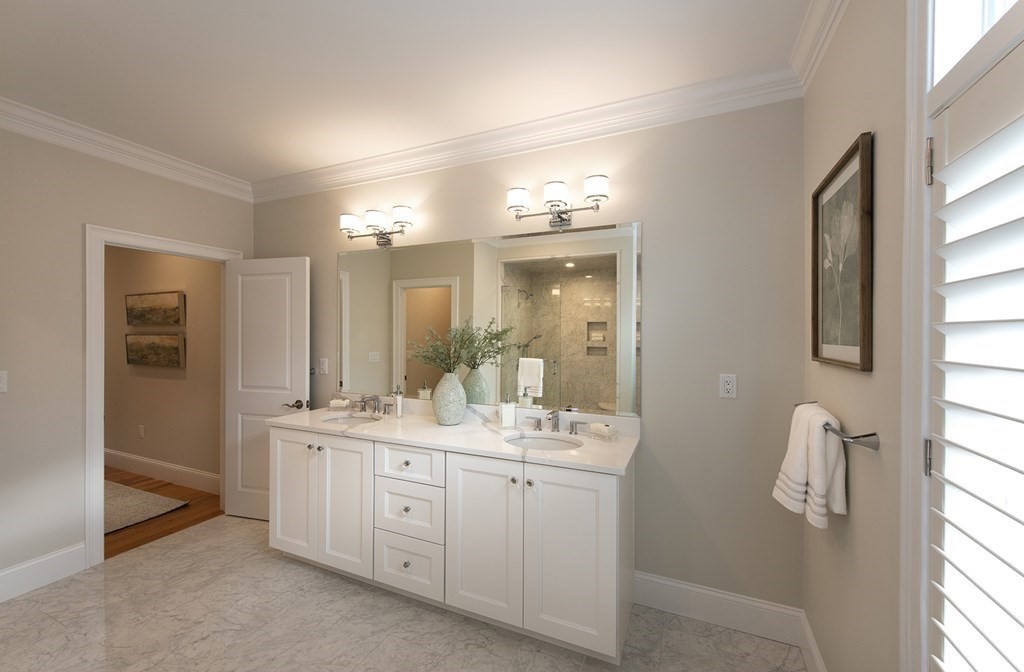 6 Robert Drive, Unit 23 Andover, MA 01810 - Photo 13 of 21 a spacious bathroom with a double vanity sink a mirror and shower