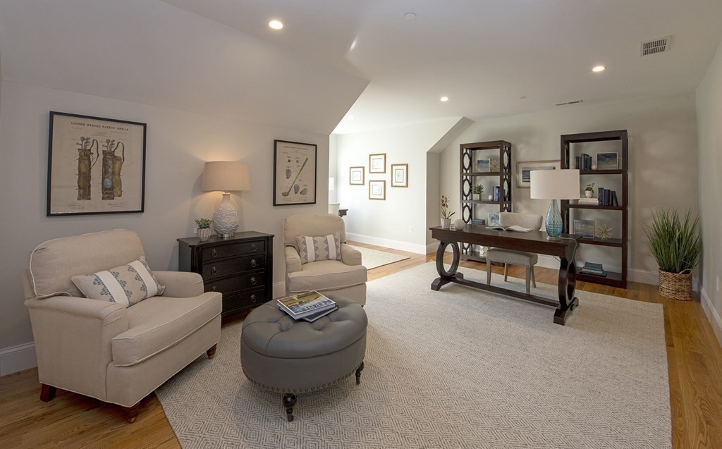 6 Robert Drive, Unit 23 Andover, MA 01810 - Photo 15 of 21 a living room with furniture and a potted plant