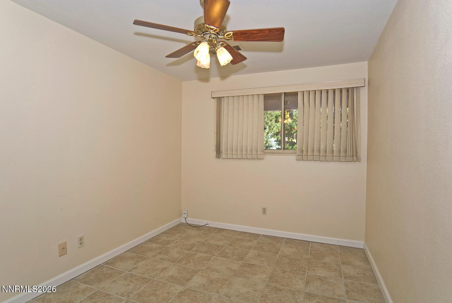 3185 Corey Drive Reno, NV 89509 - Photo 29 of 46 054-037-Downstairs Bedroom 3-1494x1000