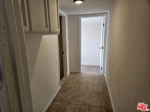 a view of hallway with closet
