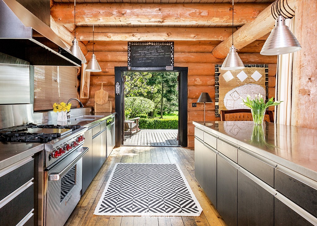 953 Lopez Road Lopez Island, WA 98261 - Photo 14 of 25 a kitchen with stainless steel appliances a stove a sink and a window