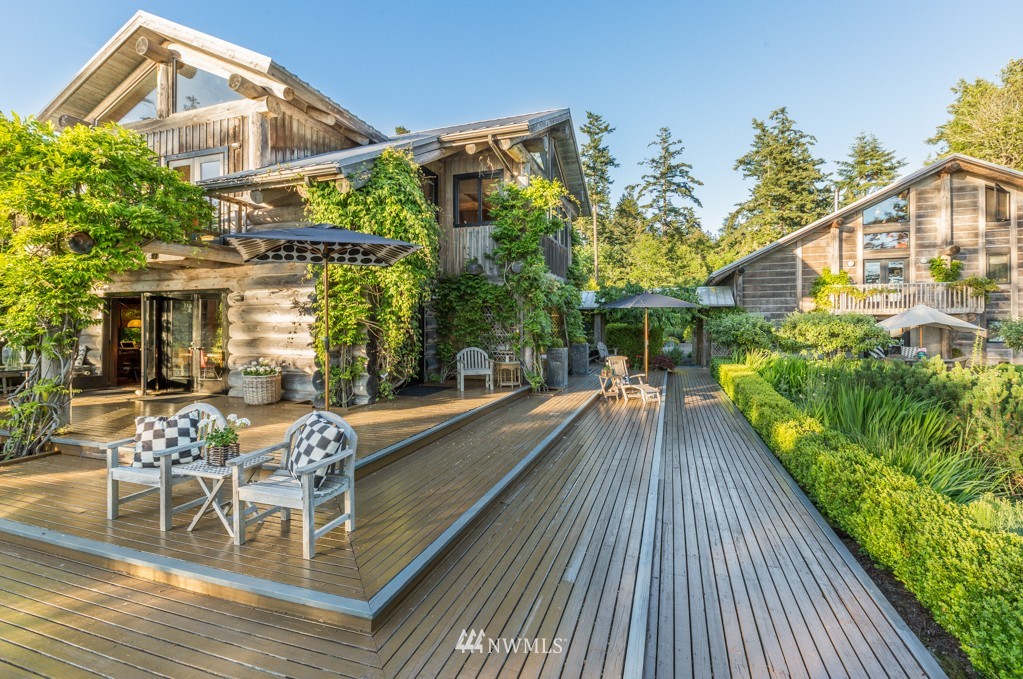953 Lopez Road Lopez Island, WA 98261 - Photo 9 of 25 a view of a house with pool and sitting area