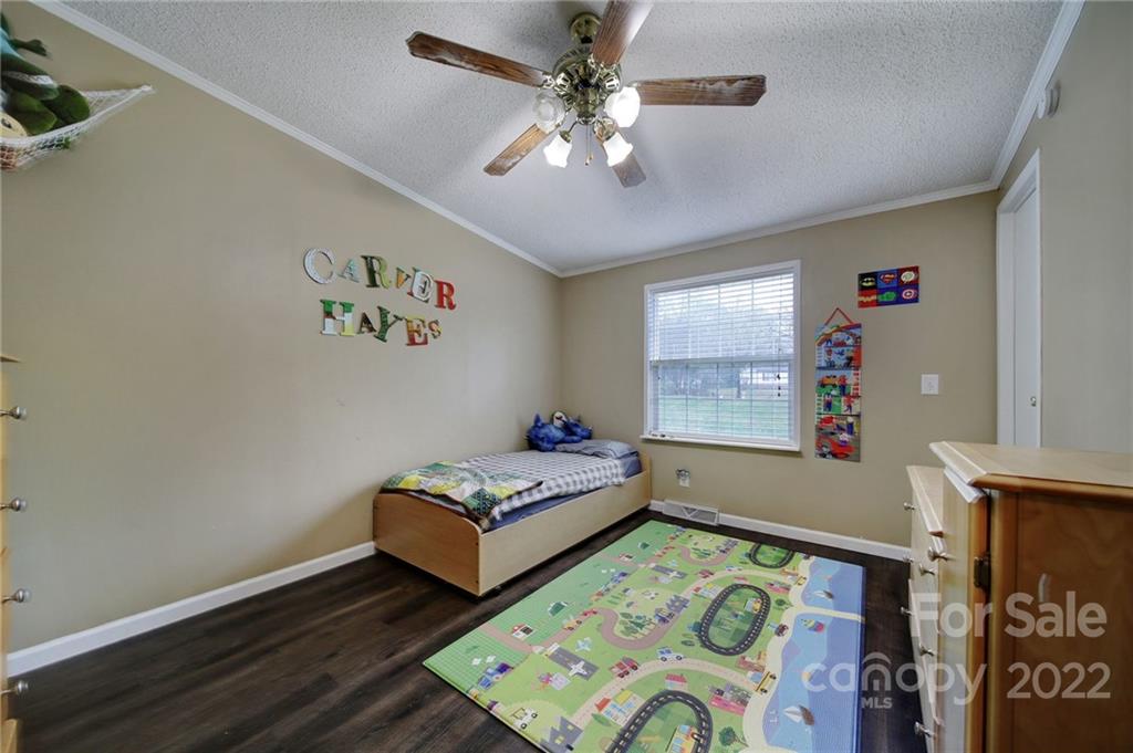 141 Old Hearth Road Clover, SC 29710 - Photo 14 of 29 a bedroom with two beds and a window