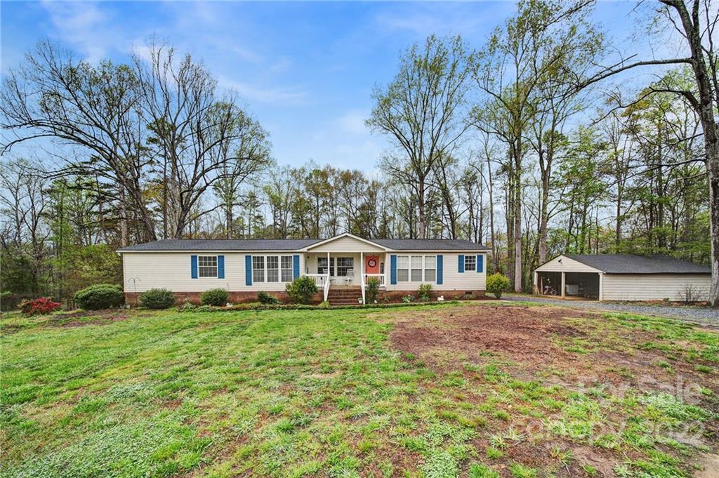 141 Old Hearth Road Clover, SC 29710 - Photo 23 of 29 front view of a house with a yard