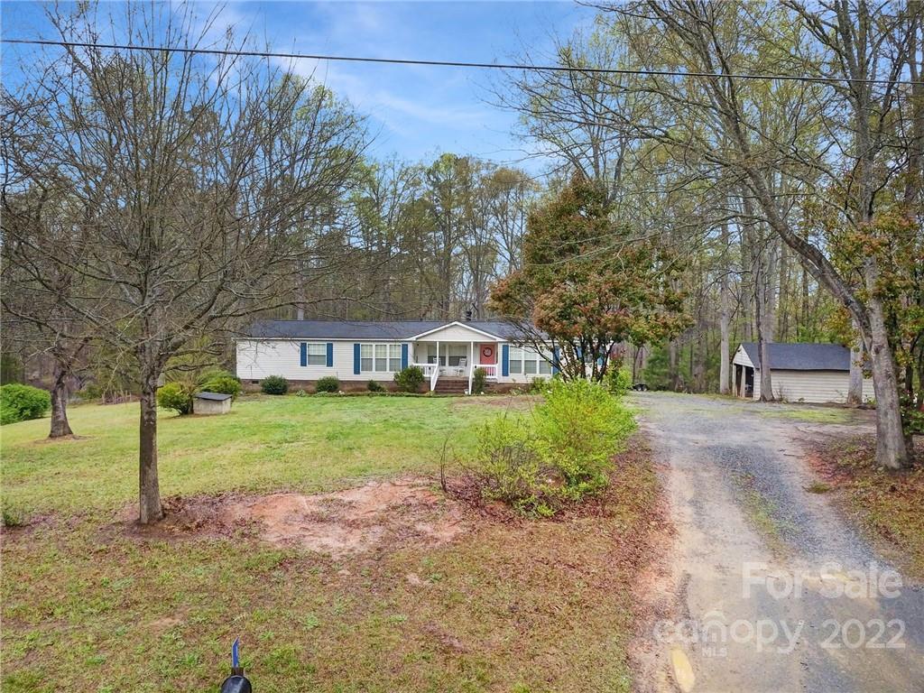 141 Old Hearth Road Clover, SC 29710 - Photo 26 of 29 a view of a house with a yard