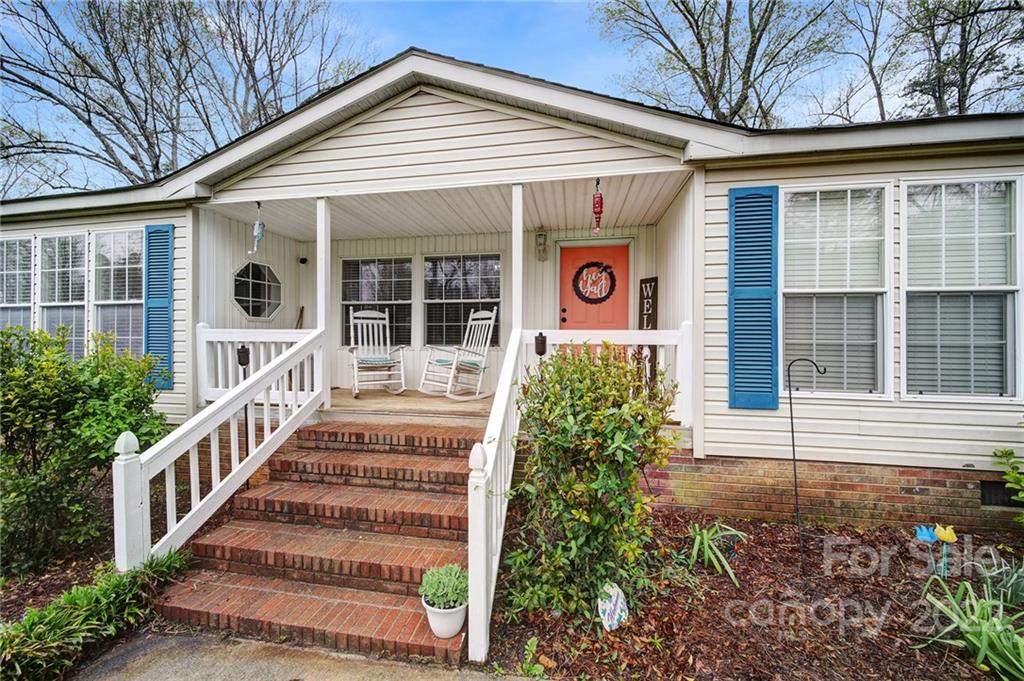 141 Old Hearth Road Clover, SC 29710 - Photo 28 of 29 a front view of a house with a porch