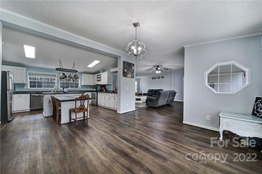 141 Old Hearth Road Clover, SC 29710 - Photo 5 of 29 a living room with furniture and kitchen view