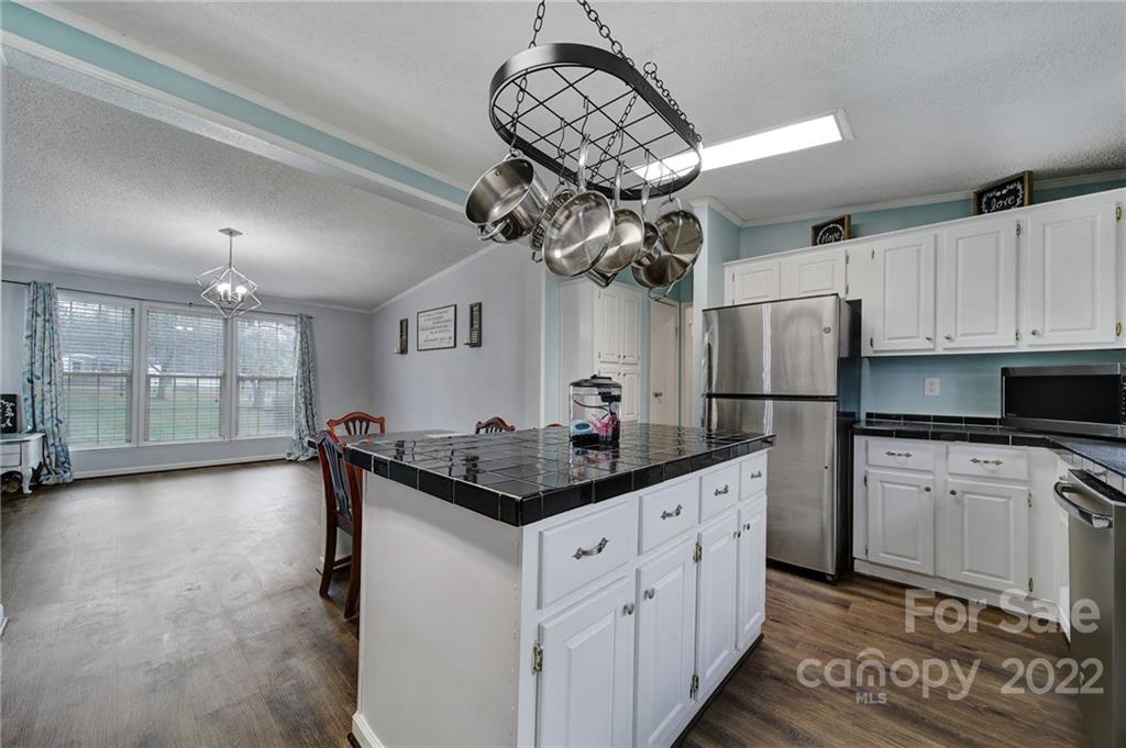 141 Old Hearth Road Clover, SC 29710 - Photo 6 of 29 a kitchen with stainless steel appliances a sink a refrigerator and a stove