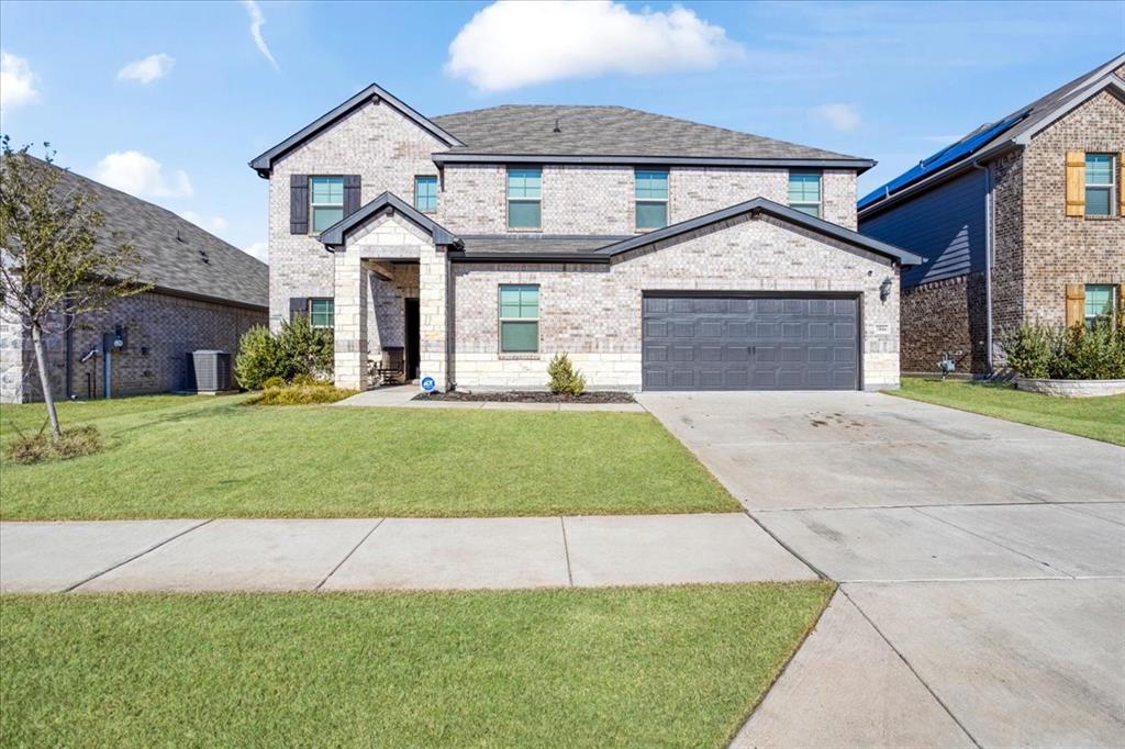 3806 Richland Drive Farmersville, TX 75442 - Photo 1 of 25 a front view of a house with a yard and garage