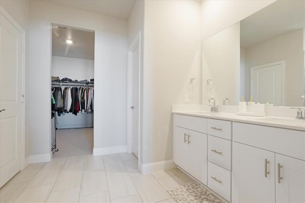 3806 Richland Drive Farmersville, TX 75442 - Photo 12 of 25 a bathroom with a sink and a mirror