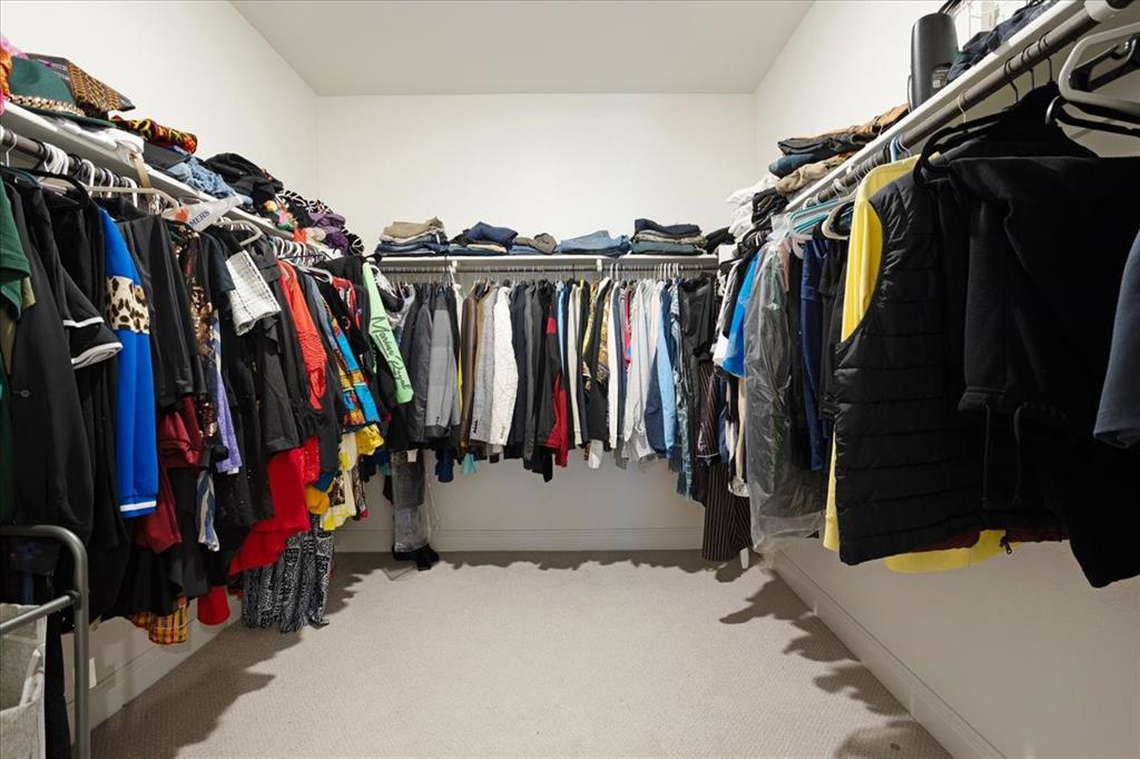 3806 Richland Drive Farmersville, TX 75442 - Photo 14 of 25 a view of walk in closet with clothes and shoes