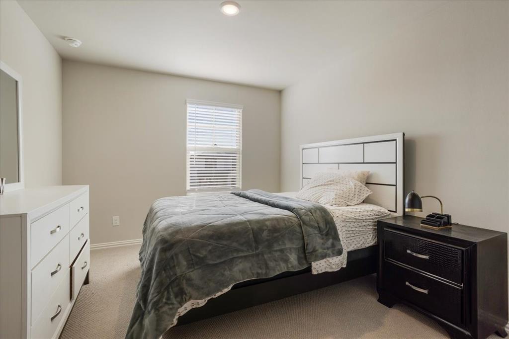 3806 Richland Drive Farmersville, TX 75442 - Photo 16 of 25 a bedroom with a bed and a window