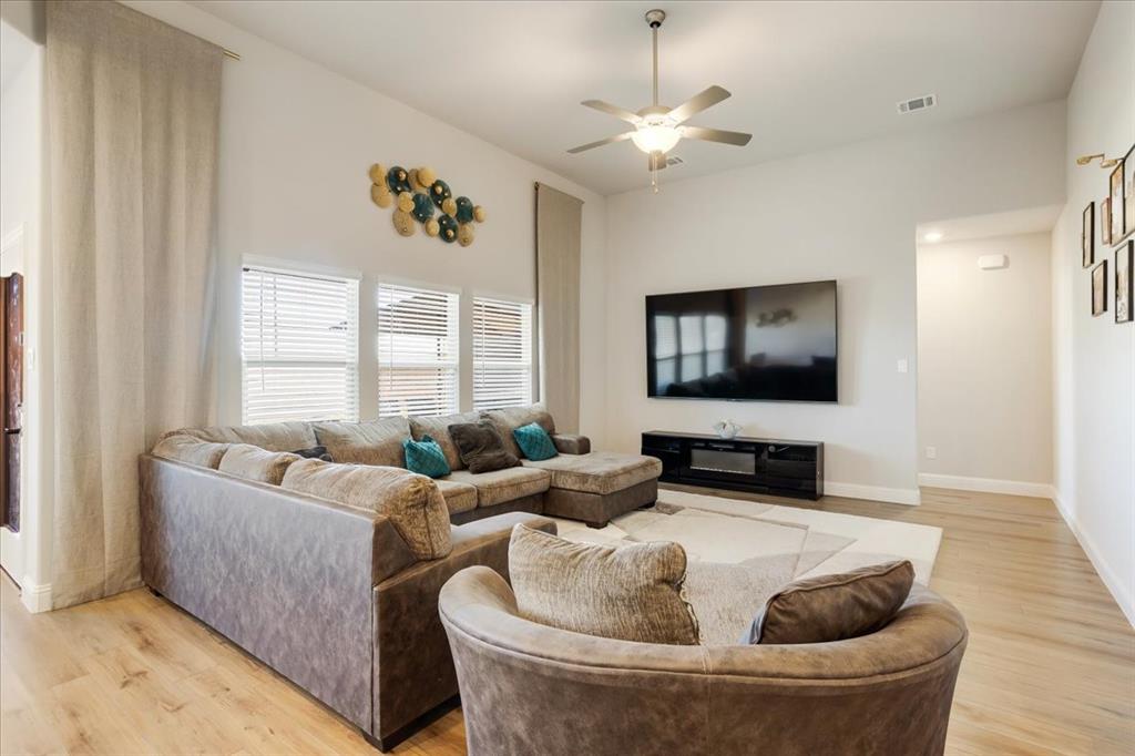 3806 Richland Drive Farmersville, TX 75442 - Photo 4 of 25 a living room with furniture and a flat screen tv