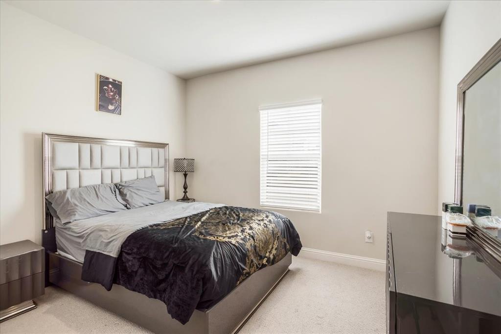 3806 Richland Drive Farmersville, TX 75442 - Photo 9 of 25 a bedroom with a bed a couch and a window