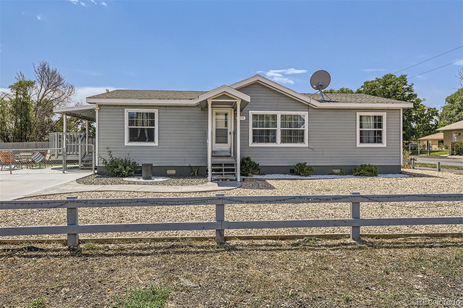 a front view of a house with a porch