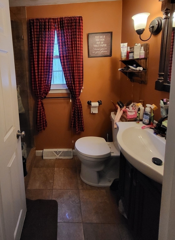 13 Ridge Road Southbridge, MA 01550 - Photo 9 of 11 a bathroom with a sink toilet and mirror