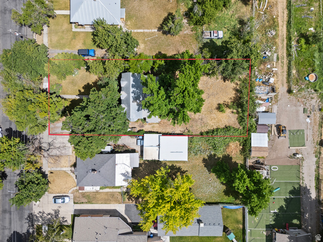 148 South 300 East Logan, UT 84321 - Photo 25 of 29 Residential lot featuring mature trees and a clear property boundary