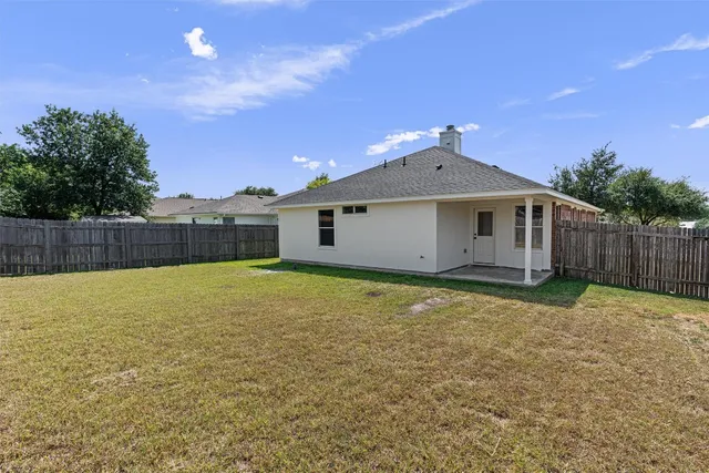 a bathroom with a sink and a yard