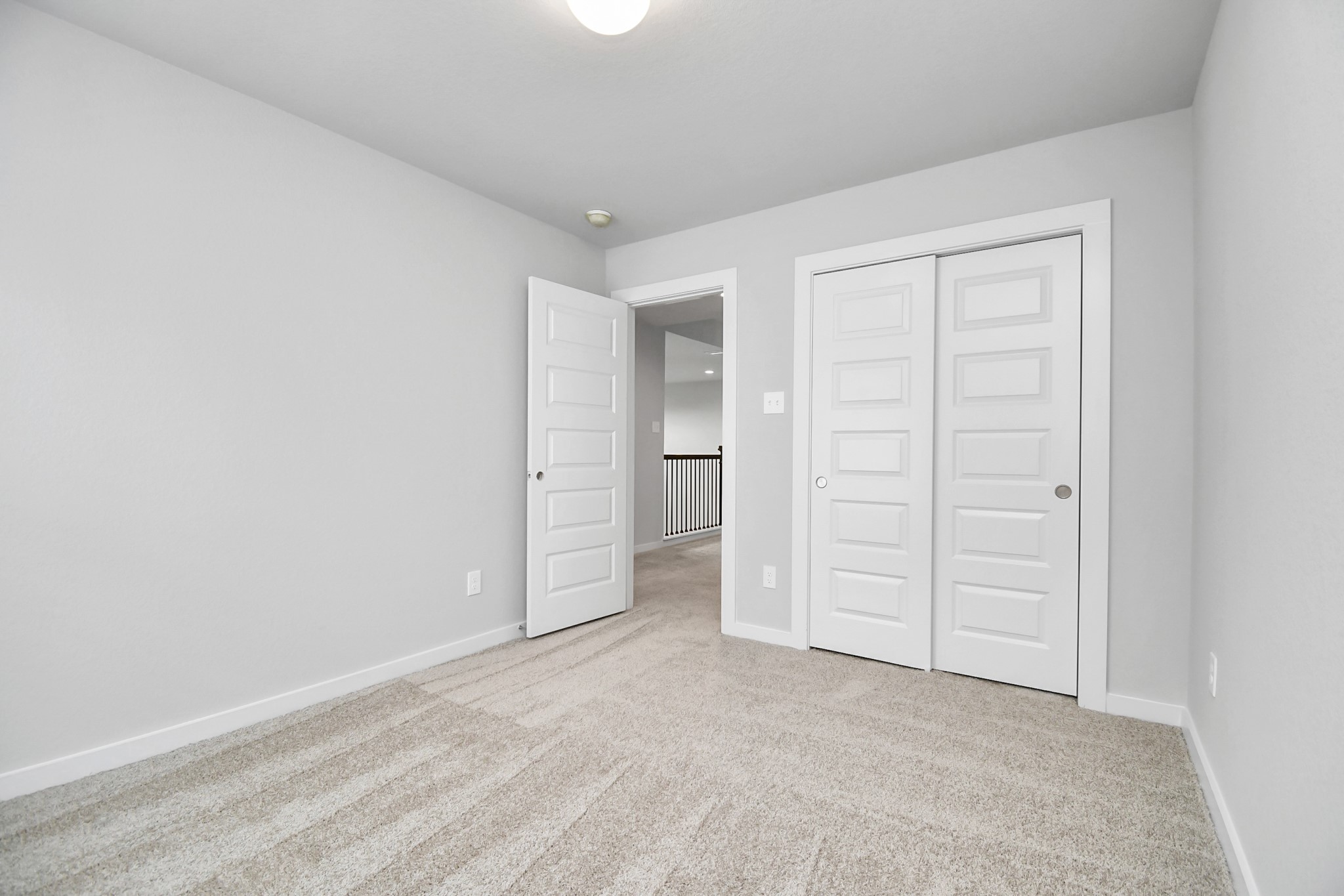 15806 Telge Ridge Lane Cypress, TX 77429 - Photo 35 of 40 an empty room with closet and mirrors