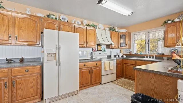 $390,000 | 29143 Hall Road, Rocky Mount, MO 65072