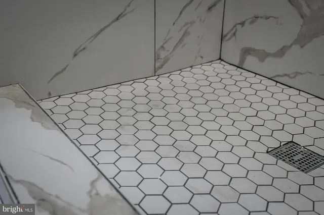 a view of a livingroom with wooden floor and closet