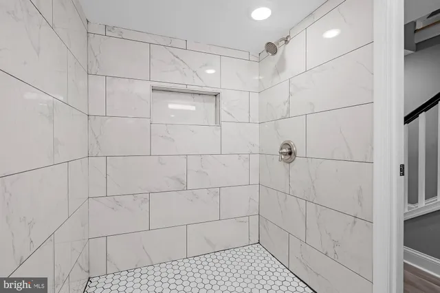 a view of entryway with wooden floor