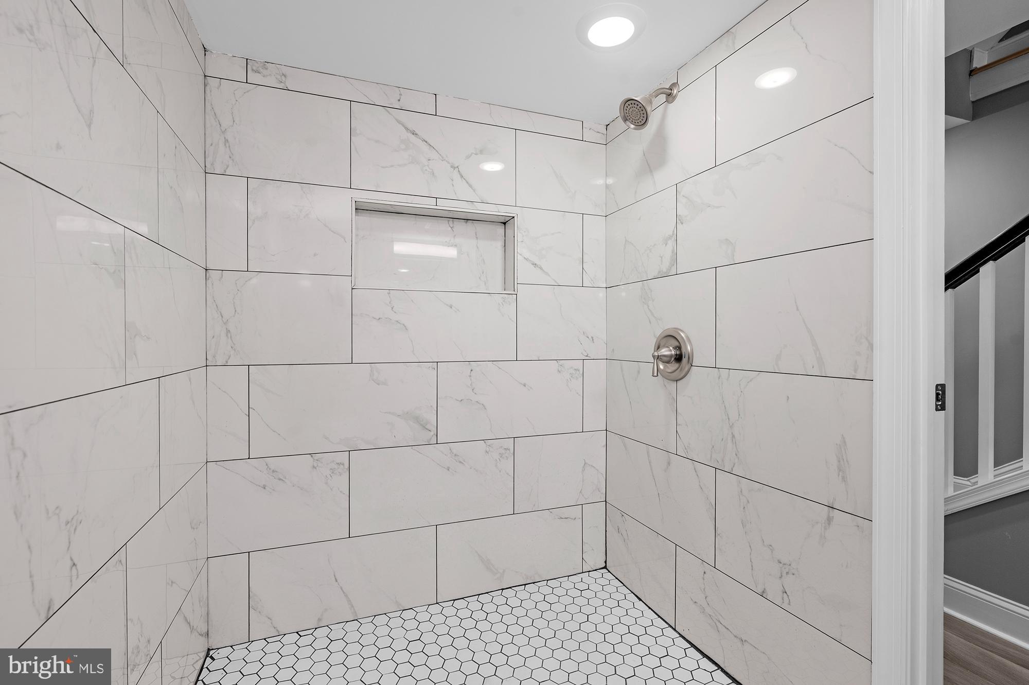 1908 East Lanvale Street Baltimore, MD 21213 - Photo 39 of 49 a bathroom with a shower