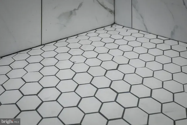 a backyard of a house with deck and furniture