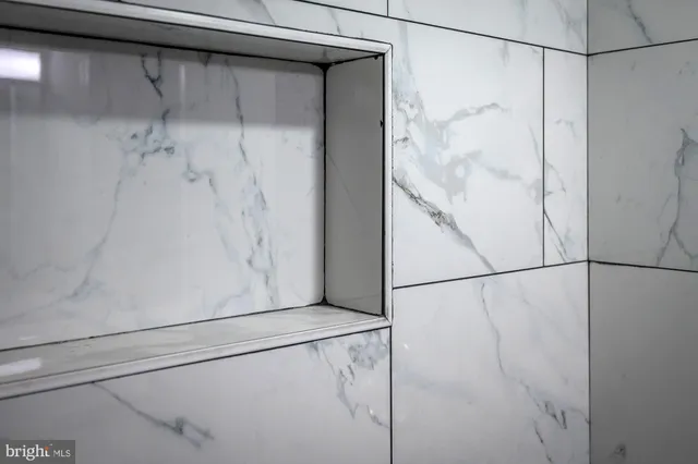 a front view of a house with stairs