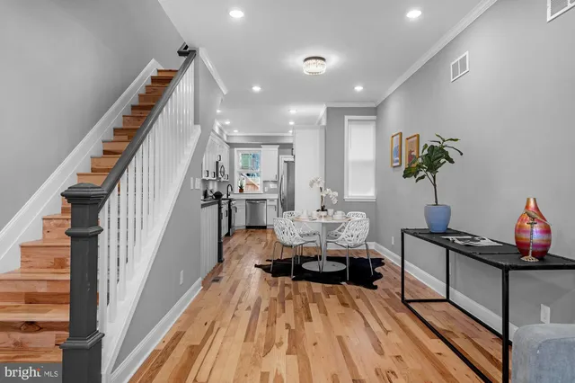 a view of living room and dining room