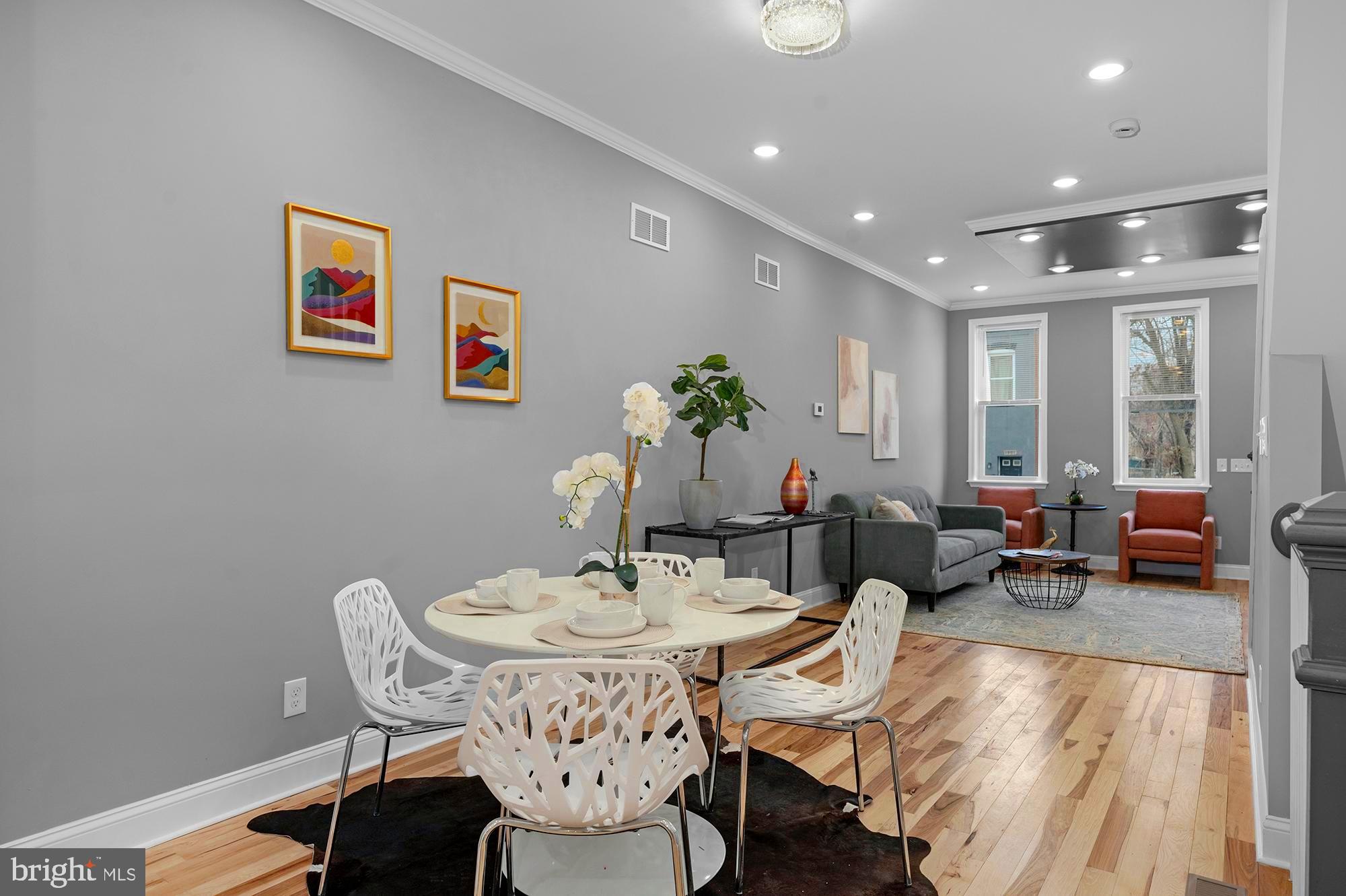 1908 East Lanvale Street Baltimore, MD 21213 - Photo 10 of 49 a view of a dining room with furniture window and wooden floor