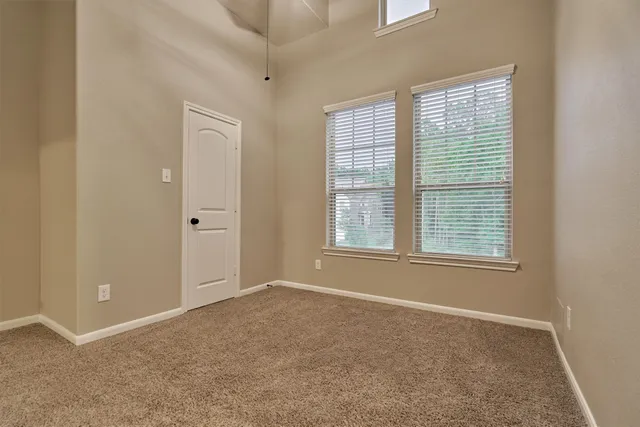 an empty room with windows