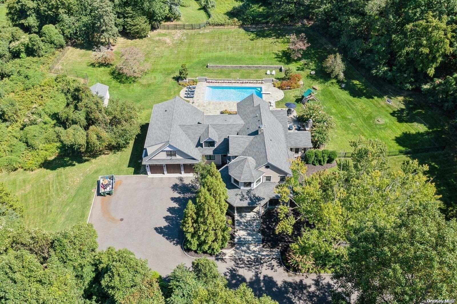 319 Old Mill Road Nissequogue, NY 11780 - Photo 1 of 1 an aerial view of a house with a garden